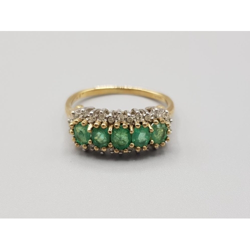 Ladies 9ct yellow gold green stone + Diamond cluster ring comprising of 5 oval green stones set in the centre surrounded by 26 round brilliant cut diamonds 2 67g Size M