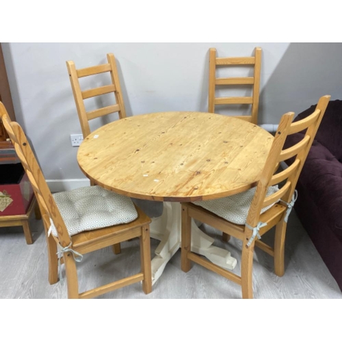 Pine circular topped kitchen table & 4 matching ladder back chairs