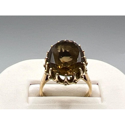 Ladies 9ct gold Smokey Quartz oval stone set ring. Size N 5.7g