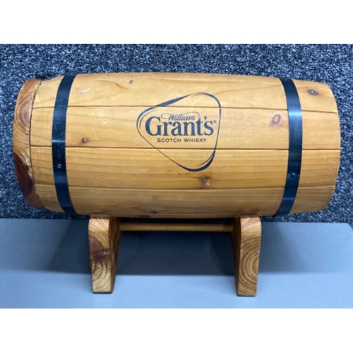 20 - William Grants Scotch whisky money box in the form of a whisky barrel, On stand