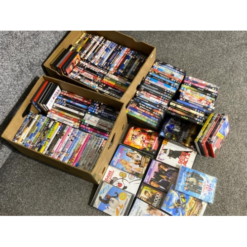 2 boxes containing a large quantity of miscellaneous DVDs