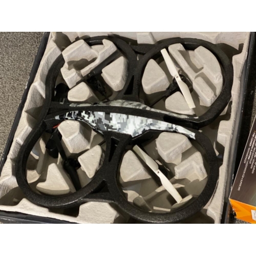 46 - Boxed Parrot AR.Drone 2.0 together with a overdrive car set