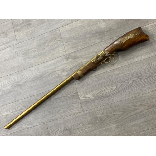 50 - Vintage ornamental brass & wooden flintlock rifle