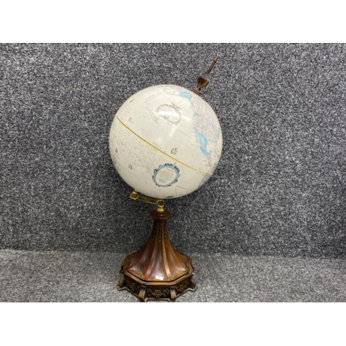 9 - Reproduction mahogany based revolving 12 inch diameter Globe from the “world classic series”