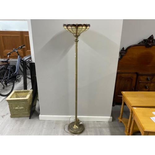 27 - Contemporary pedestal uplighter on brass effect base with glass Tiffany style shade, Height 169cm