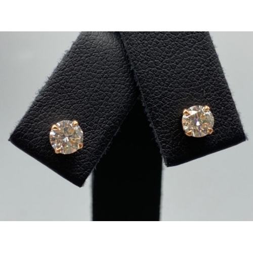 100 - 18ct Rose Gold Diamond Stud Earrings 0.84ct total weighing 1.24 grams