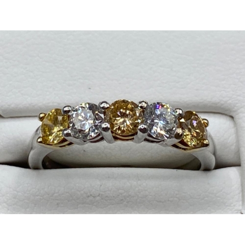32 - 18ct White Gold 5 stone ring with 0.45ct of diamonds and 0.54ct of fancy yellow diamonds size M 1/3 ... 