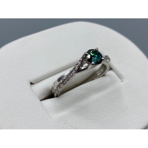 36 - 18ct White Gold Fancy Ring with a 0.40ct coloured diamond centre stone and 0.15cts of smaller diamon... 