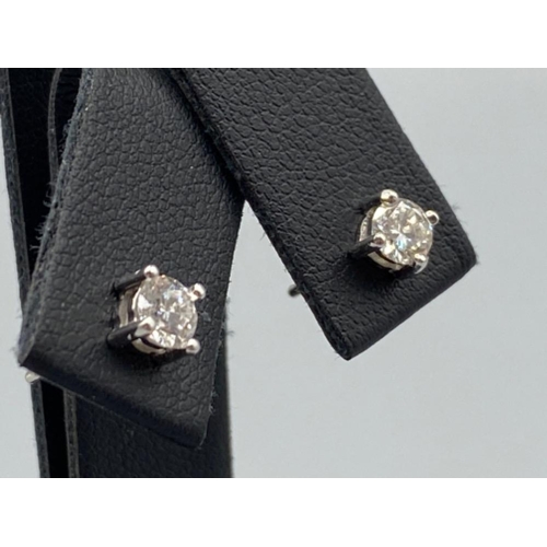 38 - 18ct White Gold Diamond Studs 0.60cts total weighing 1.16grams