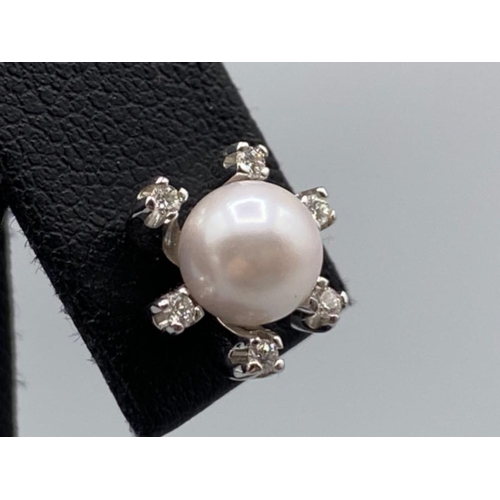 57 - Beautiful Pearl Studs each surrounded by 6 small diamonds - 0.10cts total weighing 4.36 grams