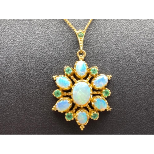 58 - 9ct Yellow Gold Pendant comprising of 7 Opals and 6 Green Stones untested and 9ct Yellow Gold Chain ... 