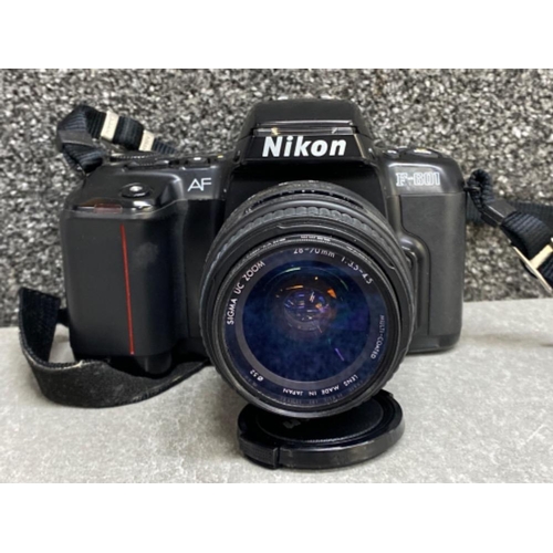 28 - Nikon F-601 camera with Hoya 52mm skylight lens