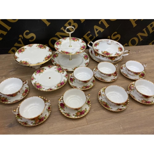 Total of 21 pieces of Royal Albert ‘old country roses’ china includes lidded tureen, cake stands & twin handled dishes with plates