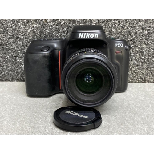 32 - Nikon F50 camera with Nikon AF Nikkor lens (35-80mm)