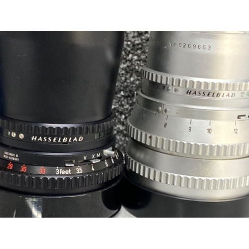 35 - 2x Hasselblad lenses includes - Carl Zeiss distagon 1:4 f=50mm & Carl Zeiss sonnar 1:4 f=150mm, both... 