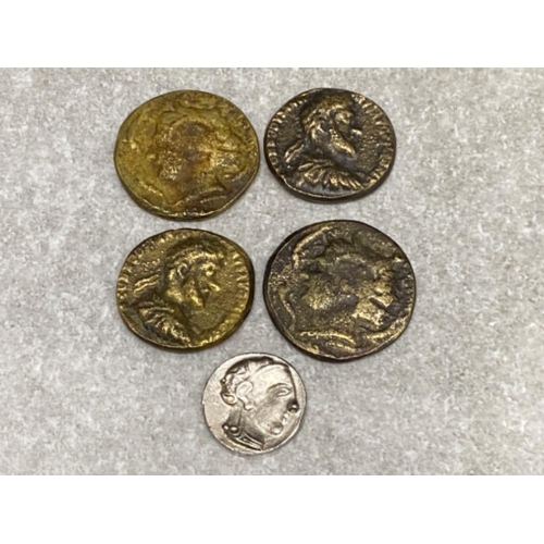 56 - Bag containing a total of 5 unauthenticated (possibly reproduction) Roman coins, 2x Commodus, 2xRoma... 