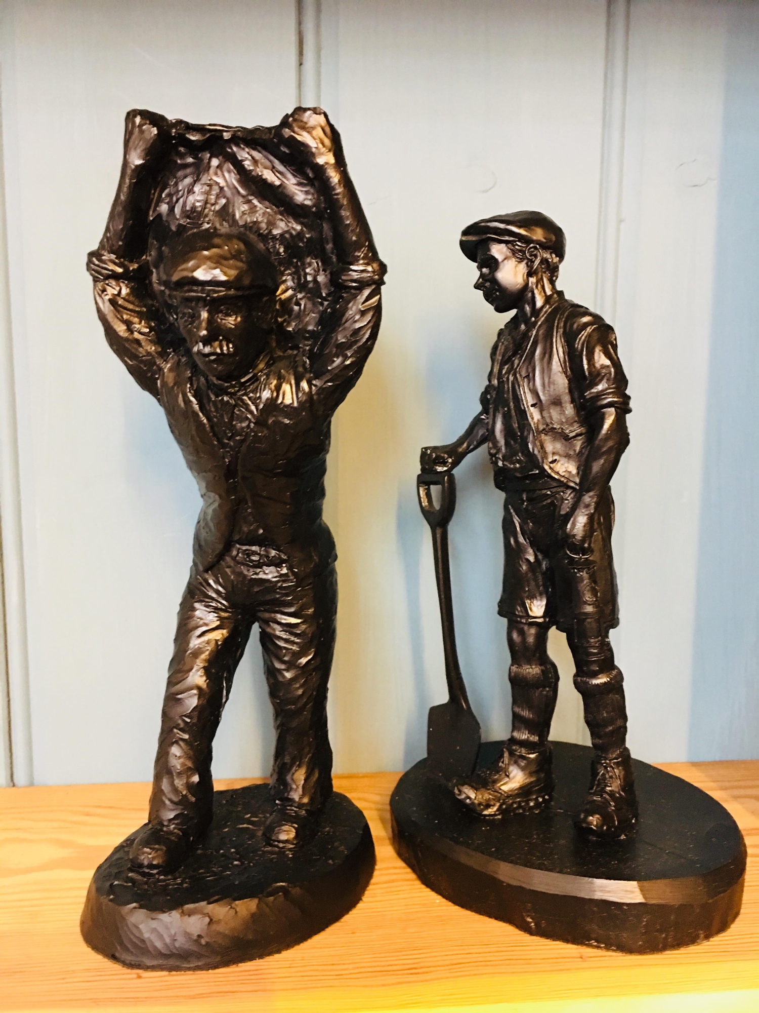 2 E.J Mining LTD figurines made with British coal, H22cms