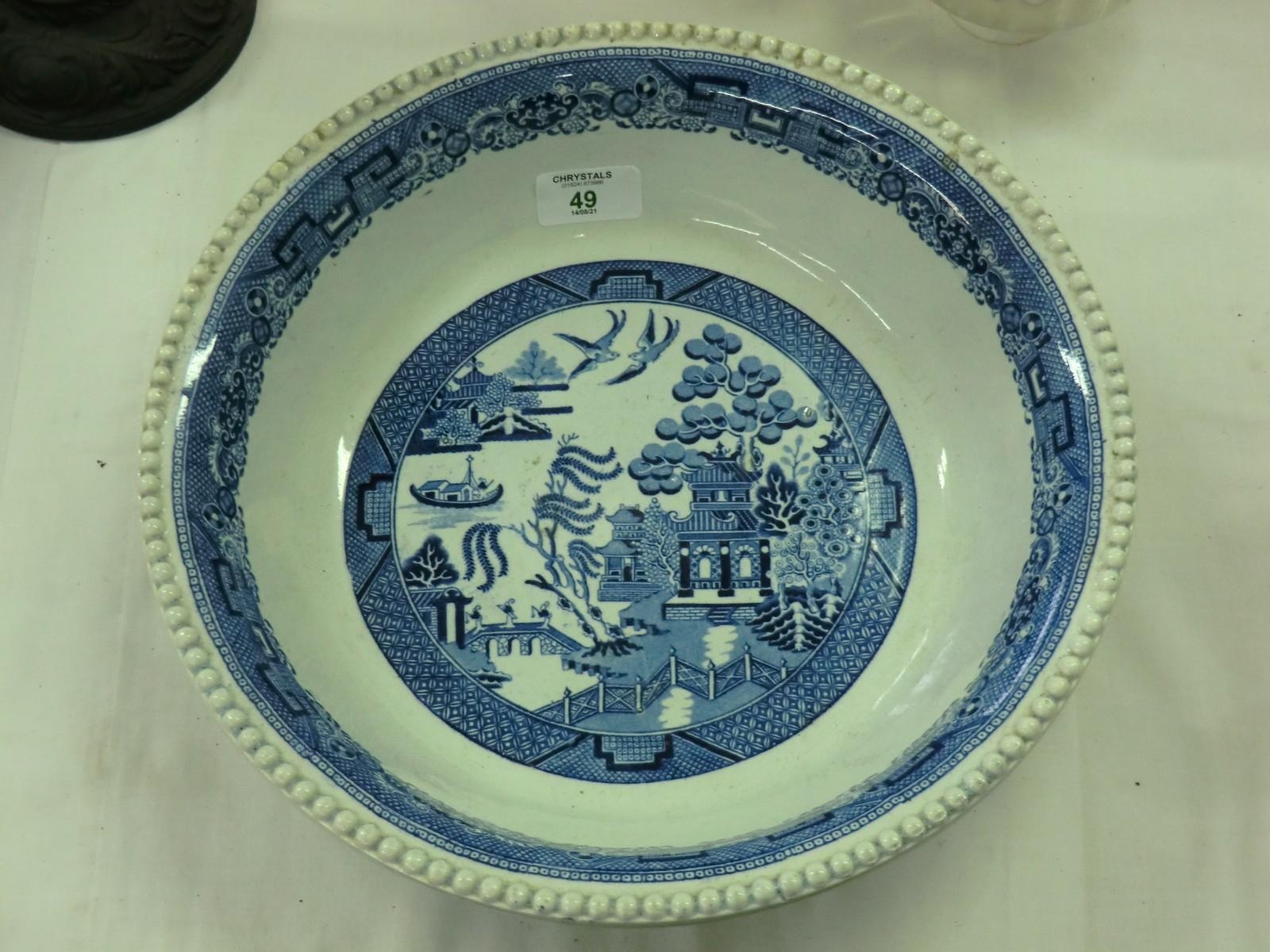 An early 19thC pottery blue and white wash bowl from a stand