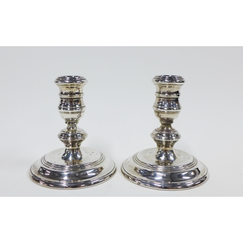 20 - Pair of silver desk candlesticks, London 1965, 11cm high, weighted base, (2)...
