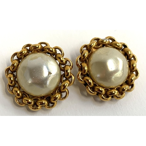 28 - A pair of vintage Chanel clip on earrings, faux pearl with gilt chain design, stamped, each 3cmD