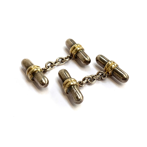 17 - A pair of 925 silver and silver gilt capsule cufflinks, total weight 20.5g; together with a pair of ... 