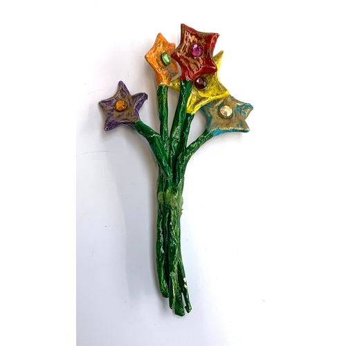 13 - A papier mache brooch by artist Julie Arkell, in the form of a bouquet of flowers, signed on reverse... 