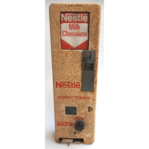 A vintage Nestle Confectionery milk chocolate dispenser, wit... Barnebys