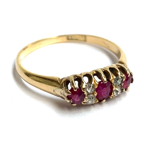 An 18ct gold ring set with rubies and diamonds, approx. 2.3g, size L 1/2