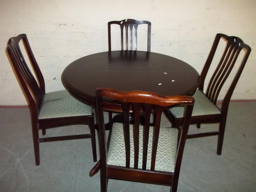 stag mahogany dining table and chairs