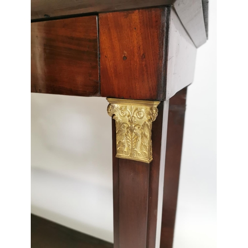 11 - 19th. C. mahogany side table, the marble top above a single drawer raised on square pillars decorate... 