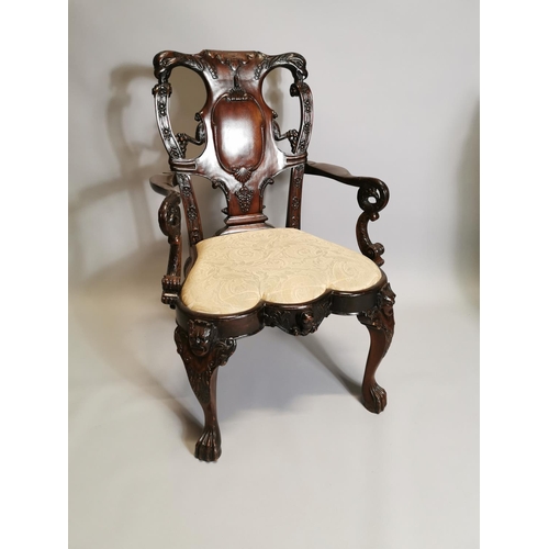 38 - Good quality carved mahogany open arm chair, decorated with Phoenix,  in the Irish Georgian manner{1... 