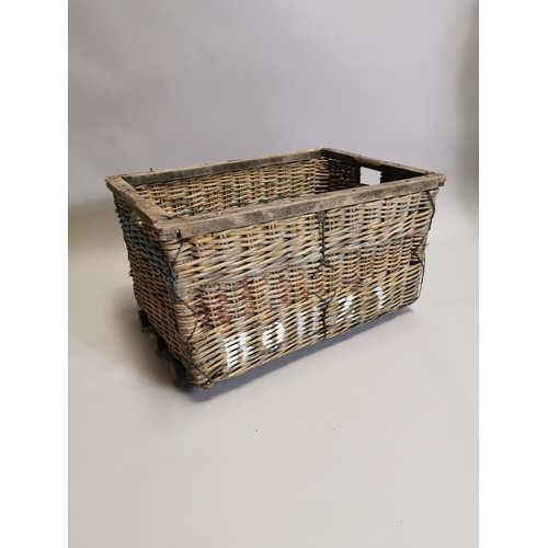 43 - Wicker log basket { 40cm H X 70cm W X 50cm D }.