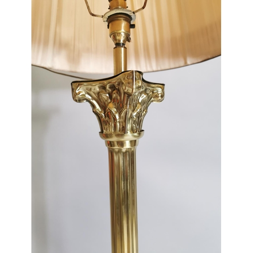 46 - Brass standard lamp with Corinthian column and shade { 167cm H }.