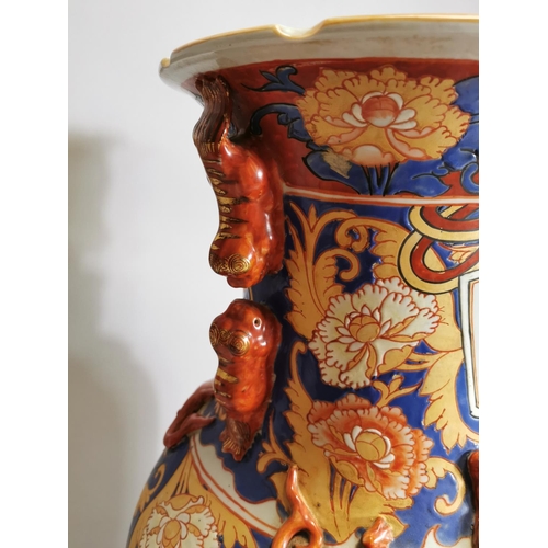 56 - Oriental ceramic vase mounted on betook wood stand { 115cm H X 39cm Dia }.