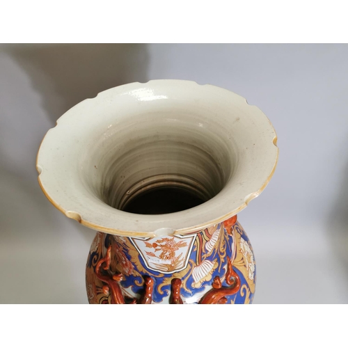 56 - Oriental ceramic vase mounted on betook wood stand { 115cm H X 39cm Dia }.