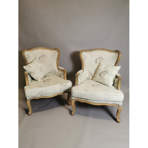 58 - Pair of upholstered oak armchairs, in the French style. {  98cm H X 73cm W X 73cm D }.
