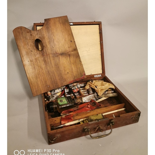 17 - 19th C. mahogany artist box containing original paints and brushes {8 cm H x 31 cm W x 26 cm D}.