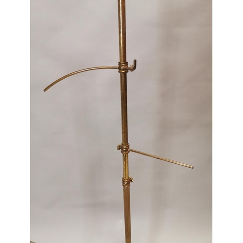 26 - Two early 20th C. brass haberdashery shop hat stands {132 cm H and 104 cm H}.