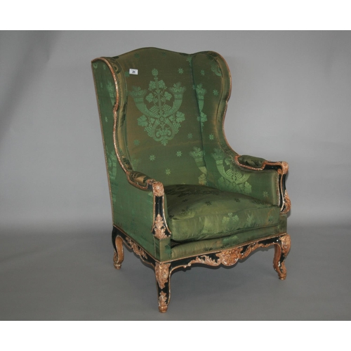 21 - 19th Century gilt and painted wing back chair with some distressing 76 W x 112 H x 80 D