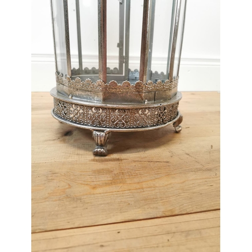 10 - Decorative metal and glass lantern {58 cm H x 25 cm Dia.}.