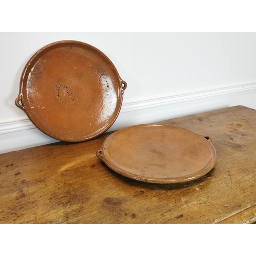 25 - Pair of early 20th C. glazed terracotta platters {39 cm Dia.}.
