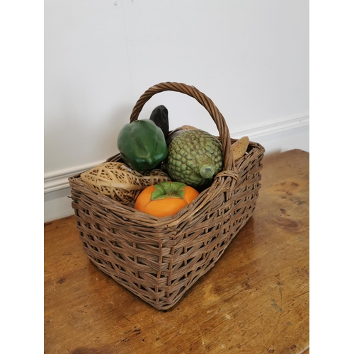 26 - Collection of early 20th C. ceramic shop display vegetables and nuts in wicker basket {32 cm H x 34 ... 