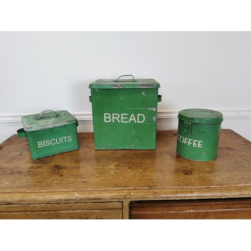 29 - Painted metal bread, coffee and biscuit tins.