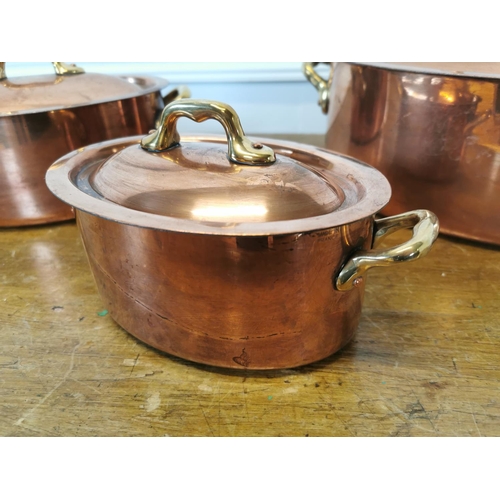 30 - Set of three exceptional quality copper lidded sauce pans with brass handles {LARGEST - 14 cm H x 31... 