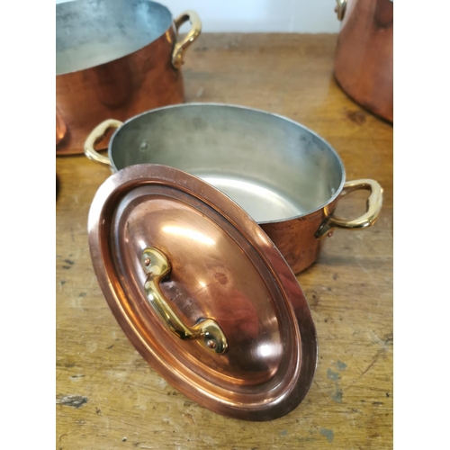 30 - Set of three exceptional quality copper lidded sauce pans with brass handles {LARGEST - 14 cm H x 31... 