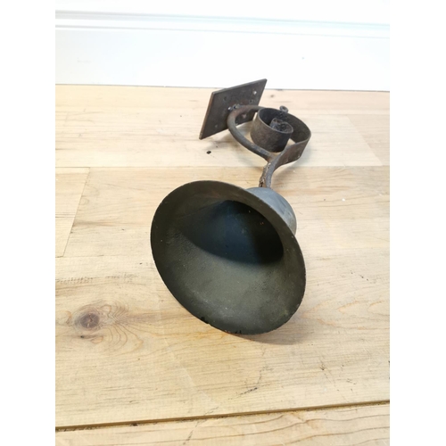 49 - Bronze bell with wall mounted bracket. {46 cm H x 15 cm W x 26 cm D}.