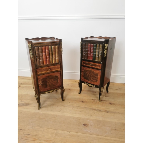 53 - Pair of French inlaid kingwood bedside lockers with ormolou mounts, two doors and single drawers {75... 