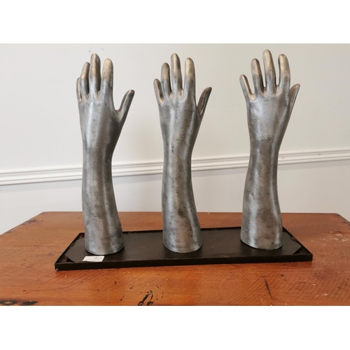 7 - Set of rare early 20th C. polished metal glove makers hands mounted on metal plinth {41 cm H x 50 cm... 