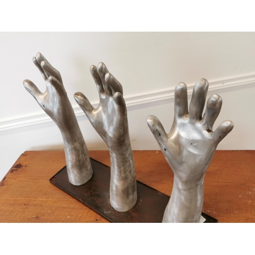 8 - Set of rare early 20th C. polished metal glove makers hands mounted on metal plinth {41 cm H x 50 cm... 