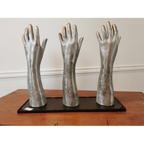 8 - Set of rare early 20th C. polished metal glove makers hands mounted on metal plinth {41 cm H x 50 cm... 